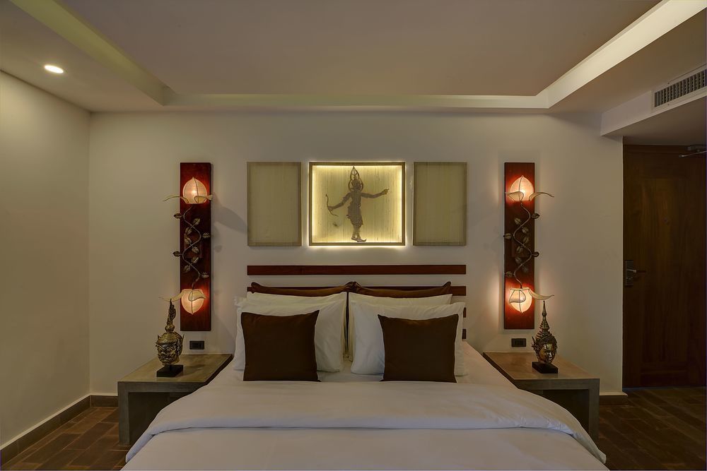 The Thirdfold Residence Сиемрип Экстерьер фото A bedroom at the hotel
