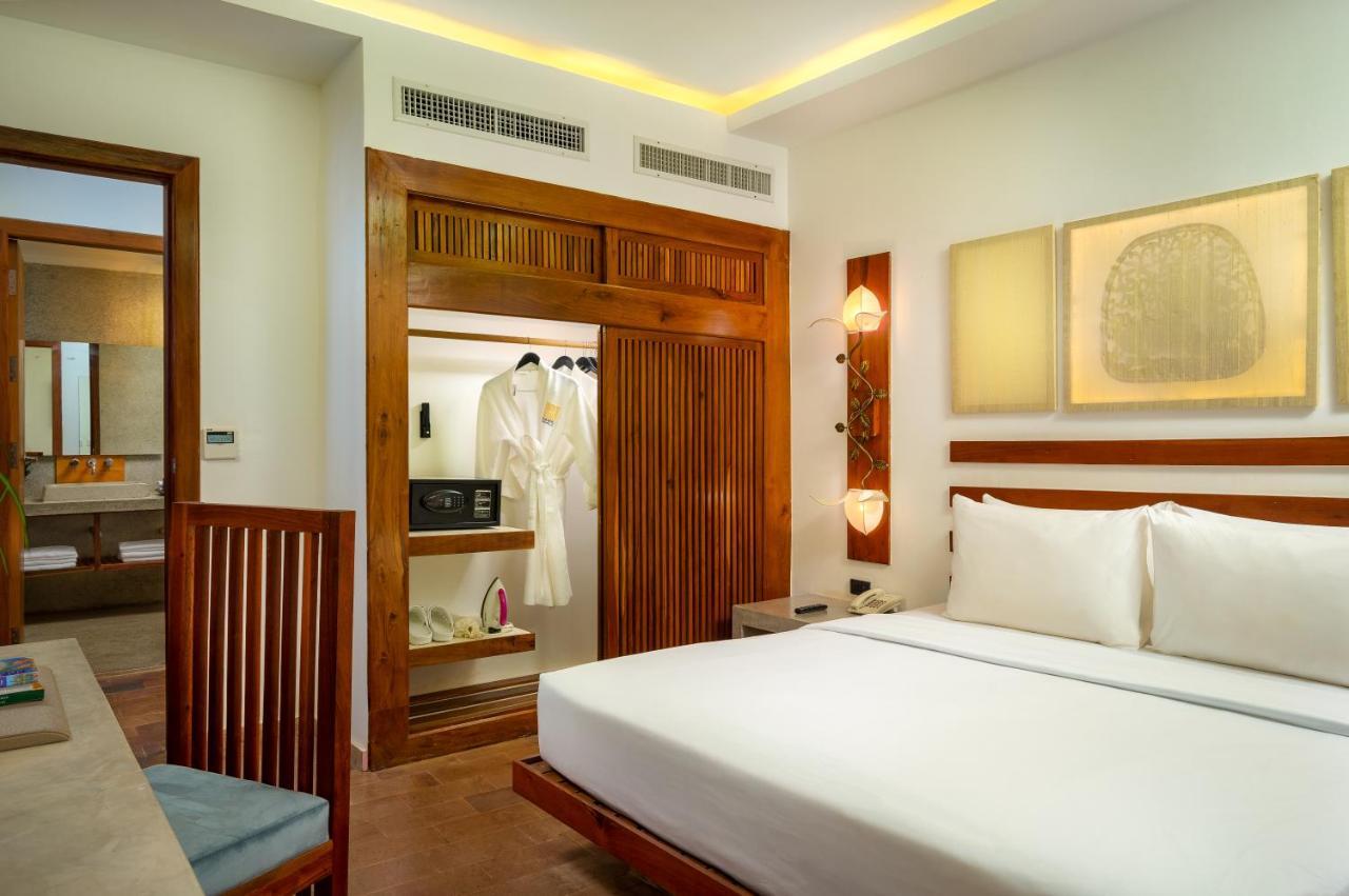 The Thirdfold Residence Сиемрип Номер фото A bedroom at the Taj Bengal